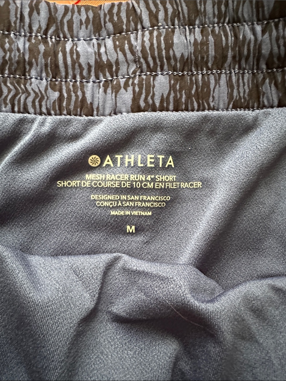 2 pair Athleta Size Medium Mesh Racer 4” Run shorts - Picture 2 of 3